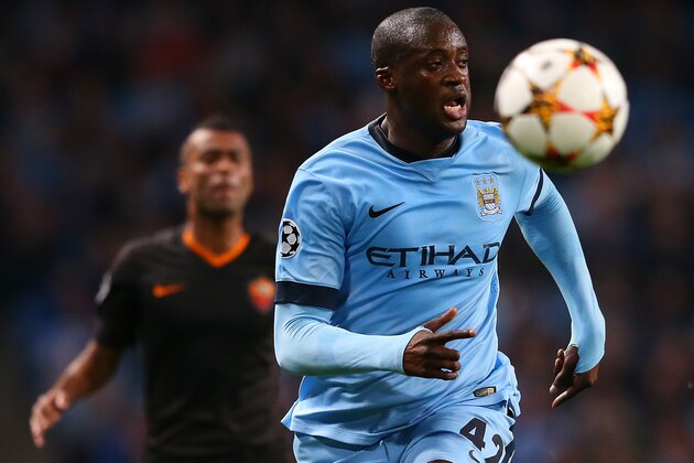 MANCHESTER, ENGLAND - SEPTEMBER 30:  Yaya Toure of Manchester City chases the ball during the UEFA Champions League Group E match between Manchester City FC and AS Roma  on September 30, 2014 in Manchester, United Kingdom.  (Photo by Alex Livesey/Getty Images)