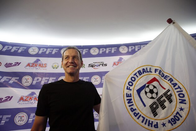 Former U.S. captain Thomas Dooley poses for photographers following his appointment as the new head coach of the Philippine national football team known as