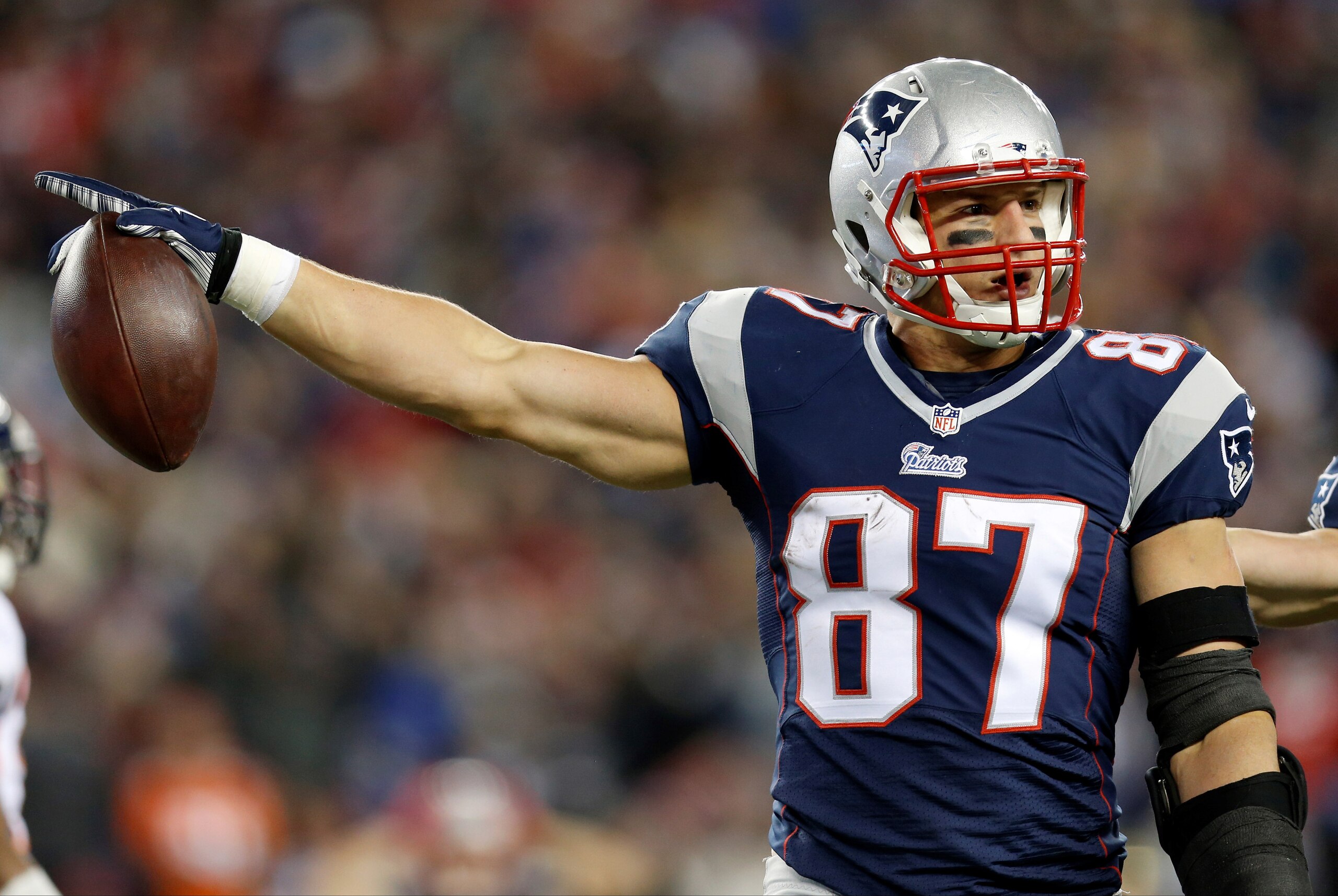 Nov 2, 2014; Foxborough, MA, USA; New England Patriots tight end Rob Gronkowski (87) reacts to a call during the fourth quarter against the Denver Broncos at Gillette Stadium. The New England Patriots won 43-21. Mandatory Credit: Greg M. Cooper-USA TODAY Sports Nov 2, 2014; Foxborough, MA, USA; New England Patriots tight end Rob Gronkowski (87) reacts to a call during the fourth quarter against the Denver Broncos at Gillette Stadium. The New England Patriots won 43-21. Mandatory Credit: Greg M. Cooper-USA TODAY Sports