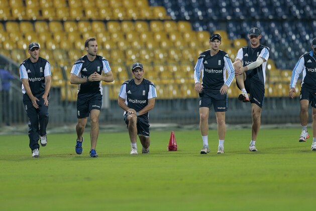 England's cricket captain Alastair Cook, third left, attends a practice session with teammates ahead of their first one-day international cricket match with Sri Lanka in Colombo, Sri Lanka, Tuesday, Nov. 25, 2014. (AP Photo/Eranga Jayawardena)