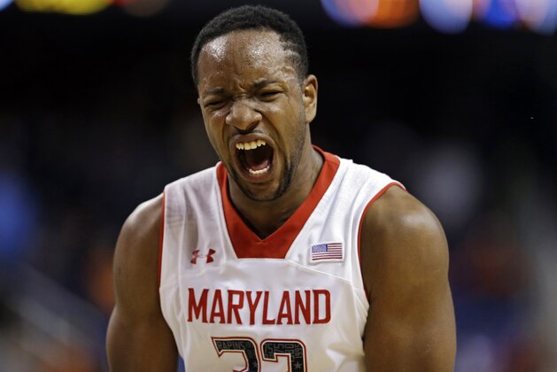 Maryland's Dez Wells (32) reacts after losing a second round NCAA college basketball game against Florida State in the second round of the Atlantic Coast Conference tournament in Greensboro, N.C., Thursday, March 13, 2014. Florida State won 67-65. (AP Photo/Gerry Broome)