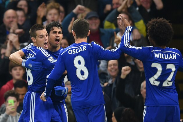 LONDON, ENGLAND - NOVEMBER 22:  Diego Costa of Chelsea celebrates scoring opening goal with team mates during the Barclays Premier League match between Chelsea and West Bromwich Albion at Stamford Bridge on November 22, 2014 in London, England.  (Photo by Tom Dulat/Getty Images)