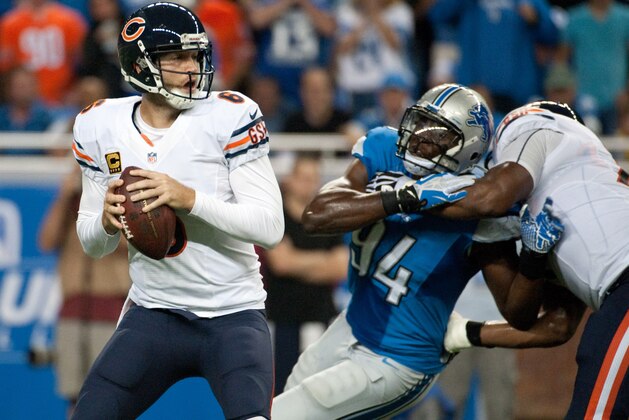 Sep 29, 2013; Detroit, MI, USA; Detroit Lions defensive end Ezekiel Ansah (94) pressures Chicago Bears quarterback Jay Cutler (6) during the first quarter at Ford Field. Mandatory Credit: Tim Fuller-USA TODAY Sports