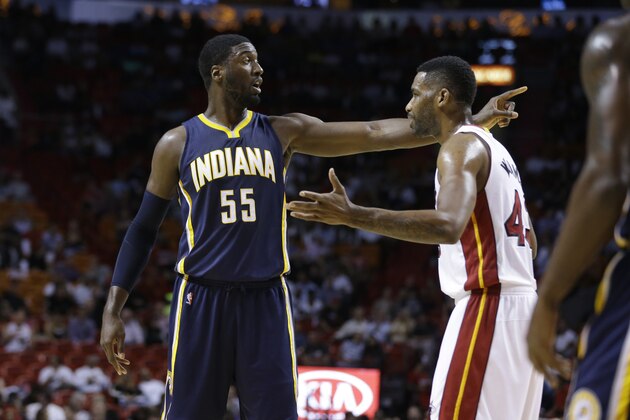 Indiana Pacers center Roy Hibbert (55) talks with Miami Heat forward Shawne Williams (43) in the first half of an NBA basketball game, Wednesday, Nov. 12, 2014, in Miami. (AP Photo/Lynne Sladky)