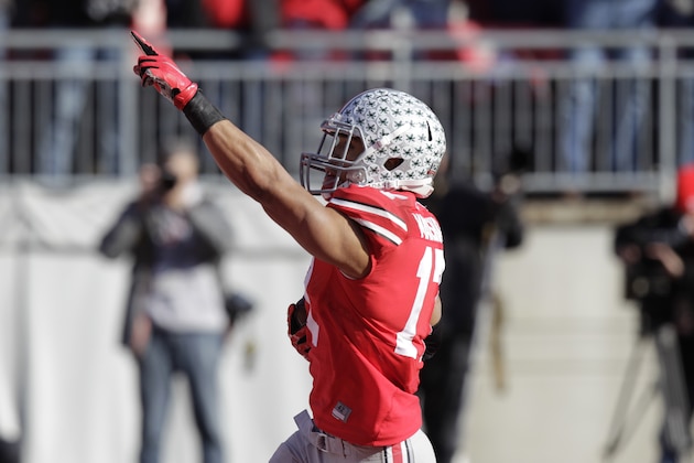 Ohio State running back Jalin Marshall celebrates his punt return for a touchdown against Indiana during the third quarter of an NCAA college football game Saturday, Nov. 22, 2014, in Columbus, Ohio. Ohio State beat Indiana 42-27. (AP Photo/Jay LaPrete)