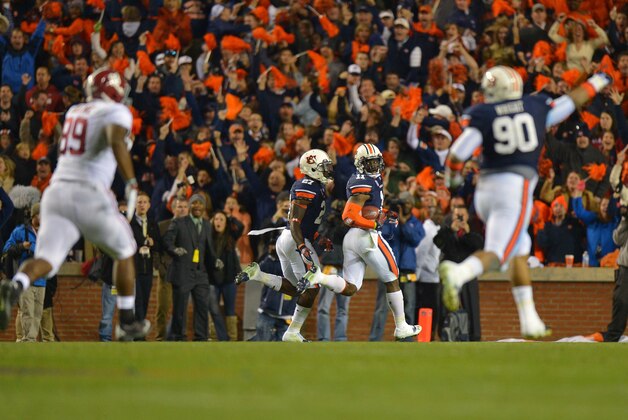 Nov 30, 2013; Auburn, AL, USA; Auburn Tigers cornerback Chris Davis (11) returns a missed field goal 109 yards with no time left in the game against the Alabama Crimson Tide at Jordan Hare Stadium. Auburn defeated Alabama 34-28. Mandatory Credit: RVR Photos-USA TODAY Sports