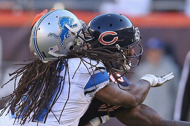 CHICAGO, IL - NOVEMBER 10:  Brandon Marshall #15 of the Chicago Bears misses a catch under pressure from Rashean Mathis #31 of the Detroit Lions at Soldier Field on November 10, 2013 in Chicago, Illinois. The Lions defeated the Bears 21-19.  (Photo by Jonathan Daniel/Getty Images)