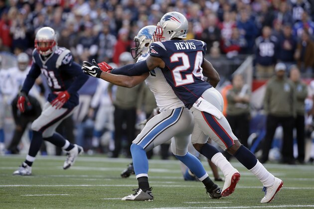 New England Patriots cornerback Darrelle Revis (24) defends agains Detroit Lions wide receiver Golden Tate in the first half of an NFL football game Sunday, Nov. 23, 2014, in Foxborough, Mass. (AP Photo/Steven Senne)