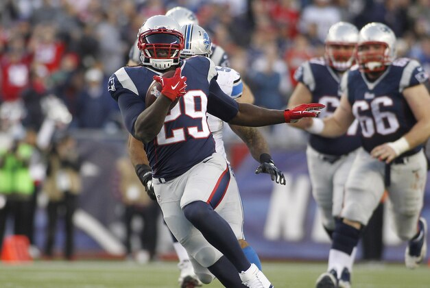 Nov 23, 2014; Foxborough, MA, USA; New England Patriots running back LeGarrette Blount (29) runs against the Detroit Lions during the fourth quarter at Gillette Stadium. Mandatory Credit: Stew Milne-USA TODAY Sports