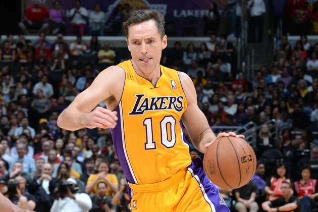 LOS ANGELES, CA - APRIL 8: Steve Nash #10 of the Los Angeles Lakers handles the ball against the Houston Rockets at Staples Center on April 8, 2014 in Los Angeles, California. NOTE TO USER: User expressly acknowledges and agrees that, by downloading and/or using this Photograph, user is consenting to the terms and conditions of the Getty Images License Agreement. Mandatory Copyright Notice: Copyright 2014 NBAE (Photo by Noah Graham/NBAE via Getty Images)