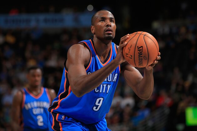DENVER, CO - NOVEMBER 19:  Serge Ibaka #9 of the Oklahoma City Thunder takes a free throw against the Denver Nuggets at Pepsi Center on November 19, 2014 in Denver, Colorado. The Nuggets defeated the Thunder 107-100. NOTE TO USER: User expressly acknowledges and agrees that, by downloading and or using this photograph, User is consenting to the terms and conditions of the Getty Images License Agreement.  (Photo by Doug Pensinger/Getty Images)