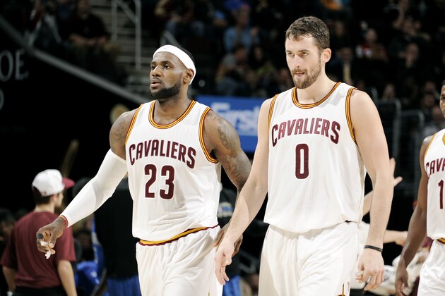 CLEVELAND, OH - NOVEMBER 24: LeBron James #23 and Kevin Love #0 of the Cleveland Cavaliers stand on the court during a game against the Orlando Magic at The Quicken Loans Arena on November 24, 2014 in Cleveland, Ohio. NOTE TO USER: User expressly acknowledges and agrees that, by downloading and/or using this Photograph, user is consenting to the terms and conditions of the Getty Images License Agreement. Mandatory Copyright Notice: Copyright 2014 NBAE (Photo by David Liam Kyle/NBAE via Getty Images)