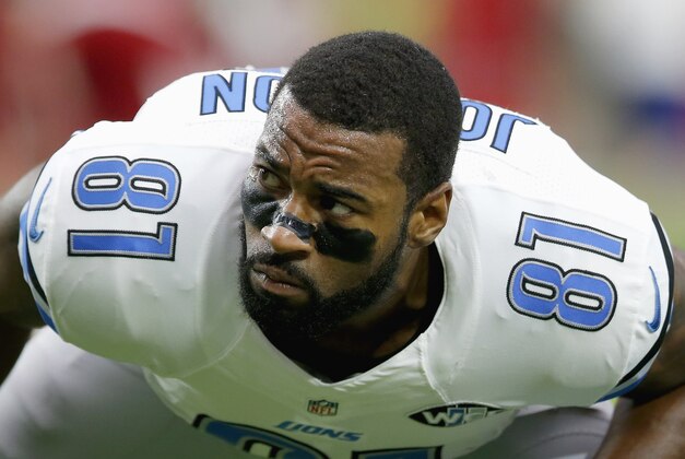 Detroit Lions' Calvin Johnson stretches out prior to an NFL football game against the Arizona Cardinals, Sunday, Nov. 16, 2014, in Glendale, Ariz. (AP Photo/Ross D. Franklin)
