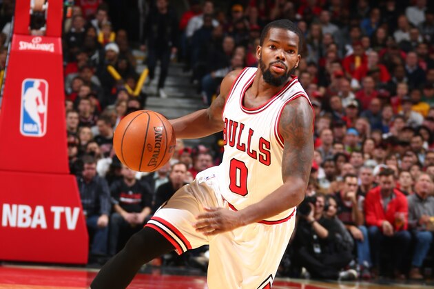 CHICAGO, IL - OCTOBER 31:  Aaron Brooks #0 of the Chicago Bulls handles the ball against the Cleveland Cavaliers during a game at the United Center  on October 31, 2014 in Chicago, Illinois. NOTE TO USER: User expressly acknowledges and agrees that, by downloading and or using this photograph, User is consenting to the terms and conditions of the Getty Images License Agreement. Mandatory Copyright Notice: Copyright 2014 NBAE (Photo by Nathaniel S. Butler/NBAE via Getty Images)