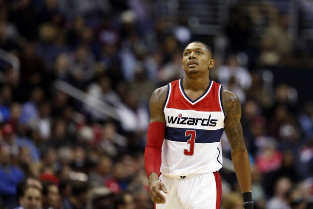 Washington Wizards guard Bradley Beal (3) reacts in the first half of an NBA basketball game against the Dallas Mavericks, Wednesday, Nov. 19, 2014, in Washington. (AP Photo/Alex Brandon)