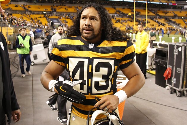 Pittsburgh Steelers strong safety Troy Polamalu (43) walks off the field after an NFL football game against the Indianapolis Colts in Pittsburgh, Sunday, Oct. 26, 2014. The Steelers won 51-34.(AP Photo/Gene J. Puskar)