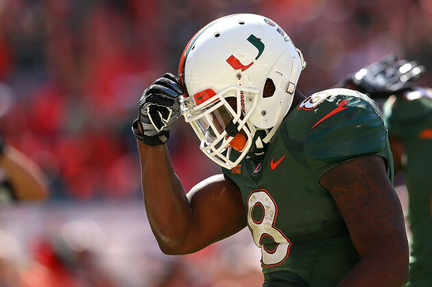 MIAMI GARDENS, FL - NOVEMBER 01:  Duke Johnson #8 of the Miami Hurricanes celebrates a touchdown during a game against the North Carolina Tar Heels at Sun Life Stadium on November 1, 2014 in Miami Gardens, Florida.  (Photo by Mike Ehrmann/Getty Images)