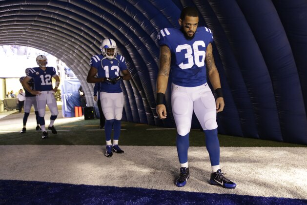 Indianapolis Colts running back Dan Herron (36) waits to be introduced before an NFL football game against the Jacksonville Jaguars Sunday, Nov. 23, 2014 in Indianapolis. (AP Photo/AJ Mast)