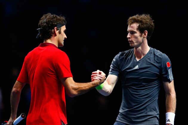 LONDON, ENGLAND - NOVEMBER 13:  Andy Murray of Great Britain congratulates Roger Federer of Switzerland after the round robin singles match  on day five of the Barclays ATP World Tour Finals at O2 Arena on November 13, 2014 in London, England.  (Photo by Julian Finney/Getty Images)