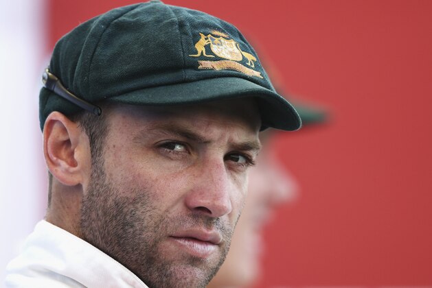 DUBAI, UNITED ARAB EMIRATES - OCTOBER 26:  Phil Hughes of Australia looks on during Day Five of the First Test between Pakistan and Australia at Dubai International Stadium on October 26, 2014 in Dubai, United Arab Emirates.  (Photo by Ryan Pierse/Getty Images)