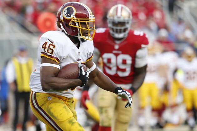 Washington Redskins running back Alfred Morris (46) runs against the San Francisco 49ers during the third quarter of an NFL football game in Santa Clara, Calif., Sunday, Nov. 23, 2014. (AP Photo/Tony Avelar)