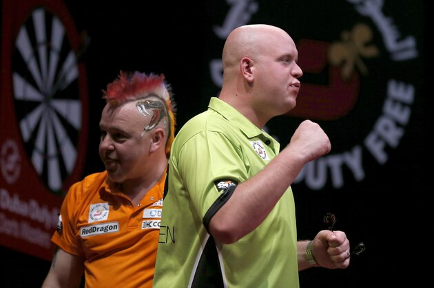 DUBAI, UNITED ARAB EMIRATES - MAY 30:  Michael Van Gerwen of the Netherlands celebrates after winning the 2014 Dubai Duty Free Darts Masters at Dubai Duty Free Tennis Stadium, Irish Village on May 30, 2014 in Dubai, United Arab Emirates. (Photo by Francois Nel/Getty Images)