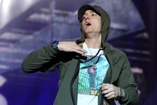 Eminem performs at Lollapalooza in Chicago's Grant Park on Friday, Aug. 1, 2014. (Photo by Steve C.  Mitchell/Invision/AP)