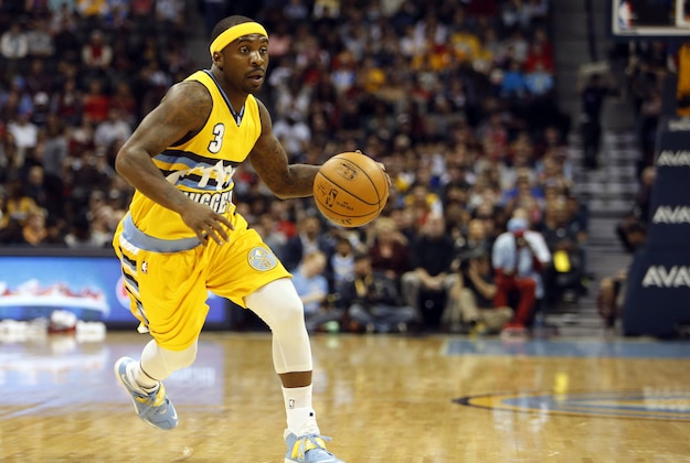 Nov 25, 2014; Denver, CO, USA; Denver Nuggets guard Ty Lawson (3) drives to the basket during the first half against the Chicago Bulls at Pepsi Center. Mandatory Credit: Chris Humphreys-USA TODAY Sports