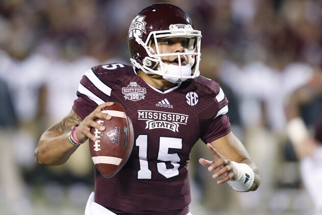 Mississippi State quarterback Dak Prescott looks for an open receiver in the first half of an NCAA college football game against Vanderbilt on Saturday, Nov. 22, 2014, in Starkville, Miss. No. 4 Mississippi State won 51-0. (AP Photo/Rogelio V. Solis)