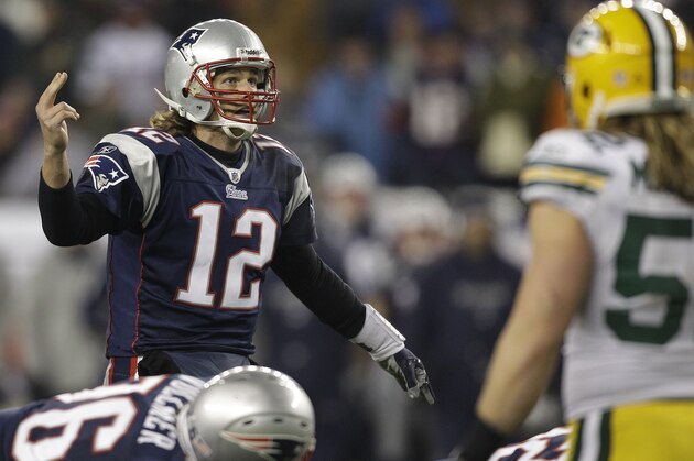 New England Patriots quarterback Tom Brady (12) during the second half of their NFL football game against the Green Bay Packers in Foxborough, Mass., Sunday night, Dec. 19, 2010. (AP Photo/Charles Krtupa)