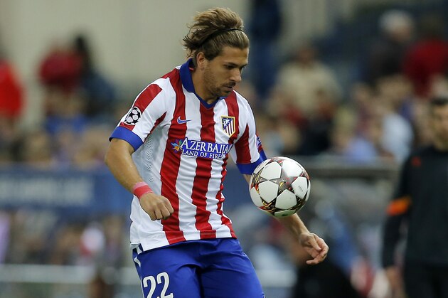 Atletico's Alessio Cerci controls the ball during the Group A Champions League soccer match between Atletico de Madrid and Malmo at the Vicente Calderon stadium in Madrid, Spain, Wednesday, Oct. 22, 2014. (AP Photo/Andres Kudacki)