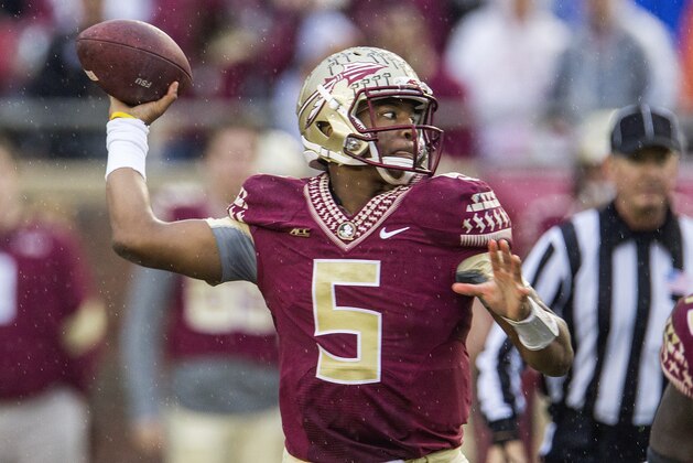 Florida State quarterback Jameis Winston throws in the first half of an NCAA college football game against Boston College in Tallahassee, Fla., Saturday, Nov. 22, 2014.  Florida State defeated Boston College 20-17.  (AP Photo/Mark Wallheiser)