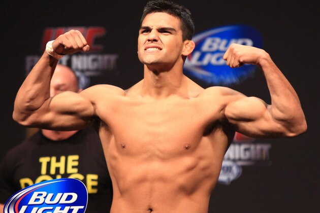 Kelvin Gastelum celebrates after defeating Jake Ellenberger, both from the United States, in a UFC 180 mixed martial arts bout in Mexico City, Saturday, Nov. 15, 2014. Gastelum won the fight by submission. (AP Photo/Christian Palma)