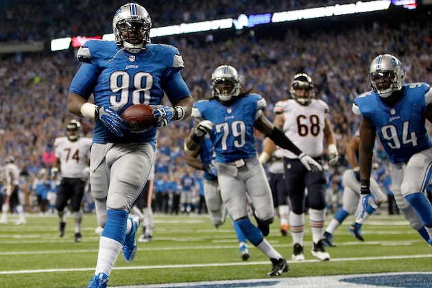 DETROIT, MI - SEPTEMBER 29:  Nick Fairley #98 of the Detroit Lions scores a touchdown off a fumble recovery in the third quarter while playing the Chicago Bears at Ford Field on September 29, 2013 in Detroit, Michigan. (Photo by Gregory Shamus/Getty Images)
