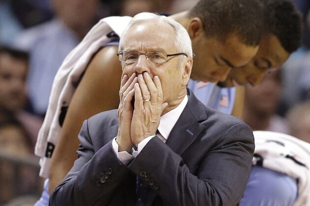 North Carolina head coach Roy Williams reacts to a call  during the first half of an NCAA college basketball game against Davidson in Charlotte, N.C., Saturday, Nov. 22, 2014. (AP Photo/Chuck Burton)