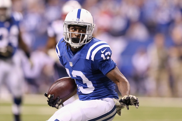 INDIANAPOLIS, IN - NOVEMBER 16:  T.Y. Hilton #13 of the Indianapolis Colts carries the ball against the New England Patriots during the game at Lucas Oil Stadium on November 16, 2014 in Indianapolis, Indiana.  (Photo by Andy Lyons/Getty Images)