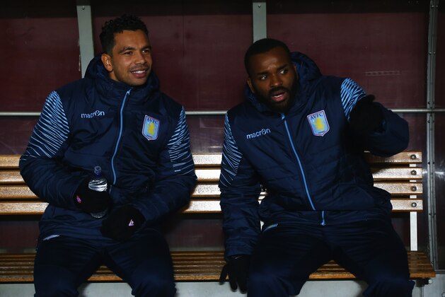 BIRMINGHAM, ENGLAND - NOVEMBER 24:  Substitutes Kieran Richardson and Darren Bent of Aston Villa (R) look on from the bench prior to the Barclays Premier League match between Aston Villa and Southampton at Villa Park on November 24, 2014 in Birmingham, England.  (Photo by Matthew Lewis/Getty Images)