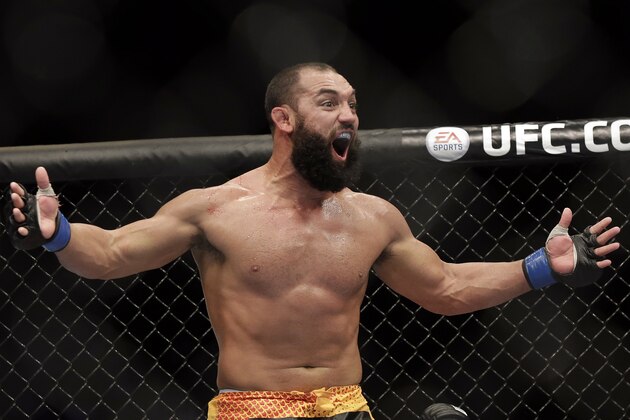 Johny Hendricks reacts following a UFC 167 mixed martial arts championship welterweight bout against Georges St. Pierre, of Canada, on Saturday, Nov. 16, 2013, in Las Vegas. St. Pierre won by split decision. (AP Photo/Isaac Brekken)