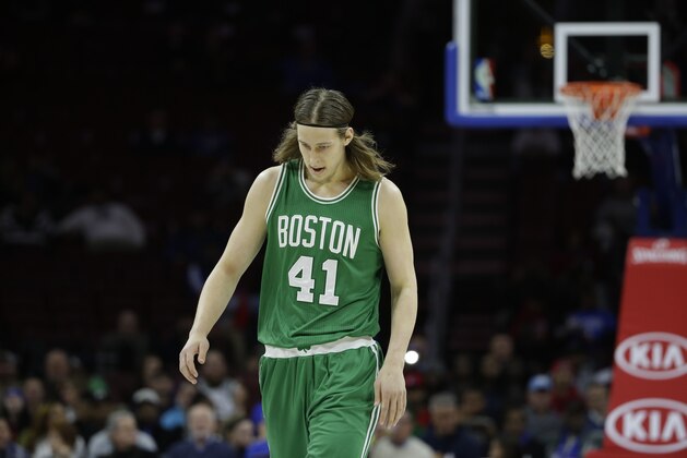 Boston Celtics' Kelly Olynyk in action during an NBA basketball game against the Philadelphia 76ers, Wednesday, Nov. 19, 2014, in Philadelphia. (AP Photo/Matt Slocum)