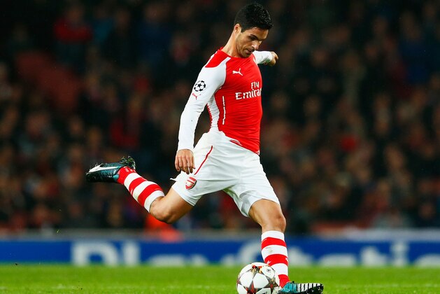 LONDON, ENGLAND - NOVEMBER 04:  Mikel Arteta of Arsenal in action during the UEFA Champions League Group D match between Arsenal FC and RSC Anderlecht at Emirates Stadium on November 4, 2014 in London, United Kingdom.  (Photo by Michael Regan/Getty Images)