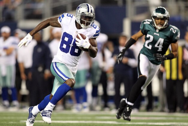 Dec 2, 2012; Arlington, TX, USA; Dallas Cowboys wide receiver Dez Bryant (88) runs for a touchdown after catching a pass by Tony Romo (not pictured) against the Philadelphia Eagles during the game at Cowboys Stadium. The touchdown pass marked Romo's 166 career touchdown setting a club record. Mandatory Credit: Tim Heitman-USA TODAY Sports