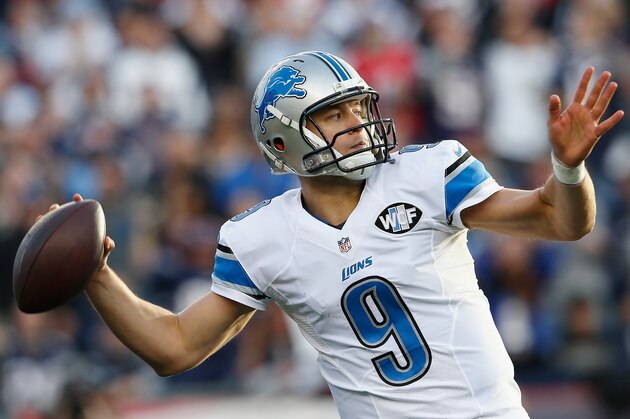 FOXBORO, MA - NOVEMBER 23:  Matthew Stafford #9 of the Detroit Lions passes the ball during the third quarter against the New England Patriots at Gillette Stadium on November 23, 2014 in Foxboro, Massachusetts.  (Photo by Jim Rogash/Getty Images)