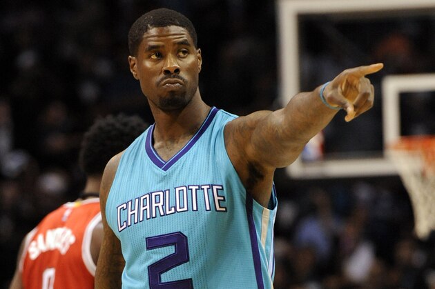 Oct 29, 2014; Charlotte, NC, USA; Charlotte Hornets forward Marvin Williams (2) signals to the crowd before the first half of the game against the Milwaukee Bucks at Time Warner Cable Arena. Mandatory Credit: Sam Sharpe-USA TODAY Sports