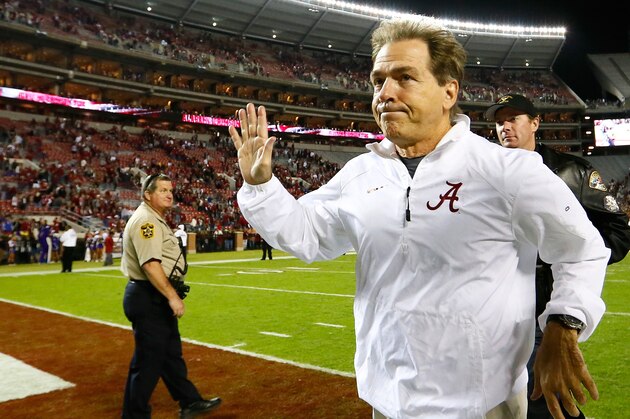 TUSCALOOSA, AL - NOVEMBER 22:  Head coach Nick Saban of the Alabama Crimson Tide runs off the field after their 48-14 win over the Western Carolina Catamounts at Bryant-Denny Stadium on November 22, 2014 in Tuscaloosa, Alabama.  (Photo by Kevin C. Cox/Getty Images)