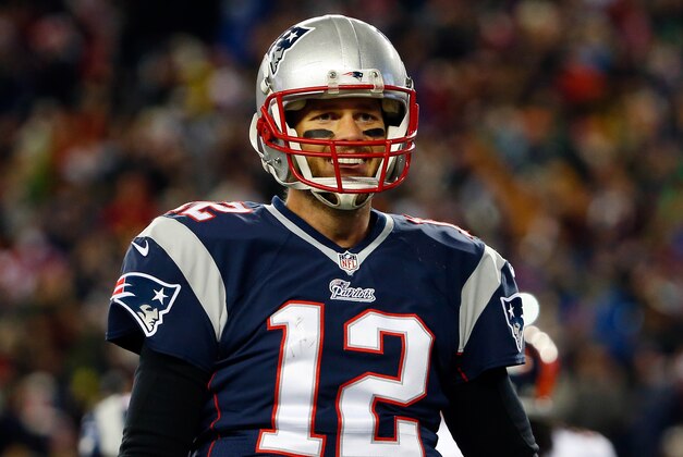 Nov 2, 2014; Foxborough, MA, USA; New England Patriots quarterback Tom Brady (12) smiles during the second quarter against the Denver Broncos at Gillette Stadium. Mandatory Credit: Winslow Townson-USA TODAY Sports