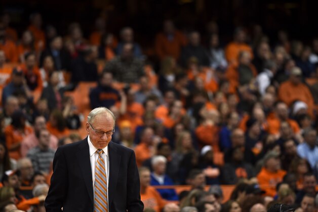 Syracuse head coach Jim Boeheim looks down in frustration during the second half against Loyola in an NCAA college basketball game in Syracuse, N.Y., Tuesday, Nov. 25, 2014.   (AP Photo/Kevin Rivoli)