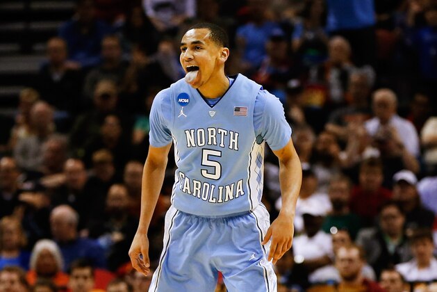 Mar 23, 2014; San Antonio, TX, USA; North Carolina Tar Heels guard Marcus Paige (5) reacts after scoring during the game against the Iowa State Cyclones in the third round of the 2014 NCAA Tournament at AT&T Center. Mandatory Credit: Kevin Jairaj-USA TODAY Sports