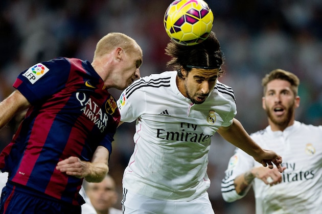 MADRID, SPAIN - OCTOBER 25:  Sami Khedira of Real Madrid CF heads the ball during the La Liga match between Real Madrid CF and FC Barcelona at Estadio Santiago Bernabeu on October 25, 2014 in Madrid, Spain.  (Photo by Gonzalo Arroyo Moreno/Getty Images)