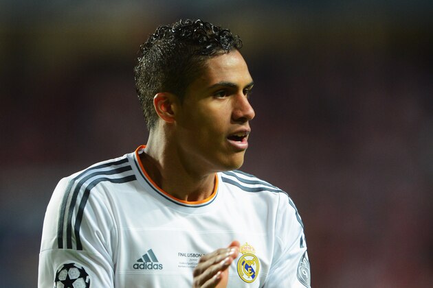 LISBON, PORTUGAL - MAY 24:  Raphael Varane of Real Madrid applauds during the UEFA Champions League Final between Real Madrid and Atletico de Madrid at Estadio da Luz on May 24, 2014 in Lisbon, Portugal.  (Photo by Michael Regan/Getty Images)