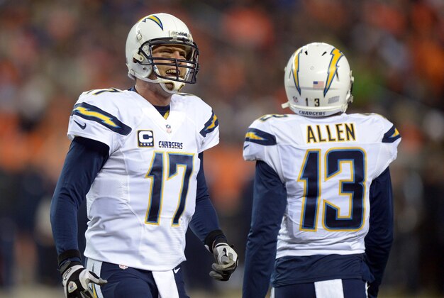 Dec 12, 2013; Denver, CO, USA; San Diego Chargers quarterback Philip Rivers (17) and receiver Keenan Allen (13) react during the game against the Denver Broncos at Sports Authority Field at Mile High. The Chargers defeated the Broncos 27-20. Mandatory Credit: Kirby Lee-USA TODAY Sports